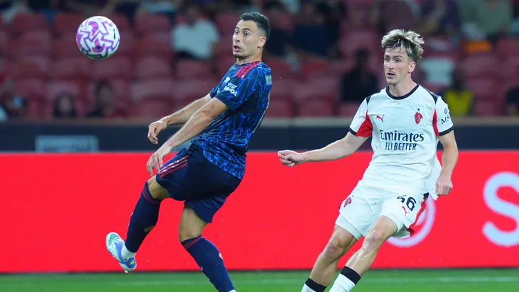 /images/a/r/s/arsenal-fc-v-ac-milan-pre-season-friendly-match-alexis-saelemaekers-of-ac-milan-shoots-past-gabriel-martinelli-of-arsenal-during-the-pre-season-friendly-match-between-arsenal-fc-and-ac-milan-at-national-stadium-in-singapore-on-july-23-2025-singapore-singapore-copyright-xsuhaimixabdullahx-originalfilenameabdullah-notitle250723npjpvjpgjpg_1754680472483.jpg
