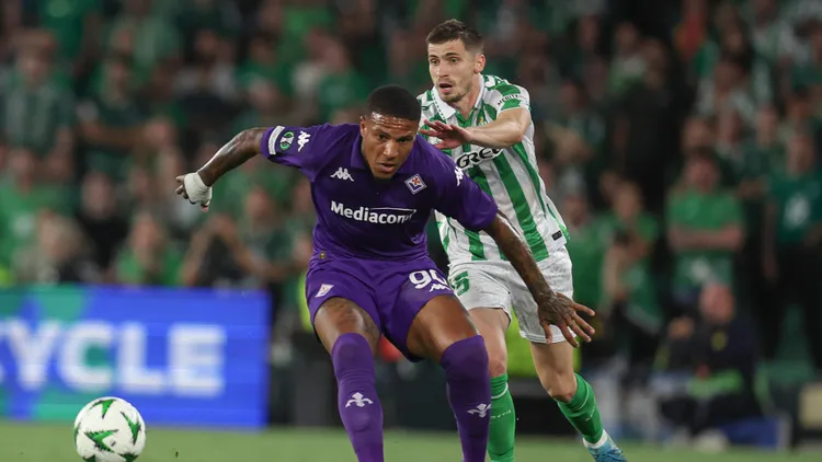 /images/e/s/p/esp-real-betis-acf-fiorentina-uefa-conference-league-michael-folorunsho-of-acf-fiorentina-and-romain-perraud-of-real-betis-during-the-uefa-conference-league-semi-finals-match-between-real-betis-and-acf-fiorentina-played-at-benito-villamarin-stadium-on-may-01-2025-in-sevilla-spain-kpng-copyright-xantonioxpozox-xpressinphotox-ap240501betfio149jpg_1752515388885.jpg