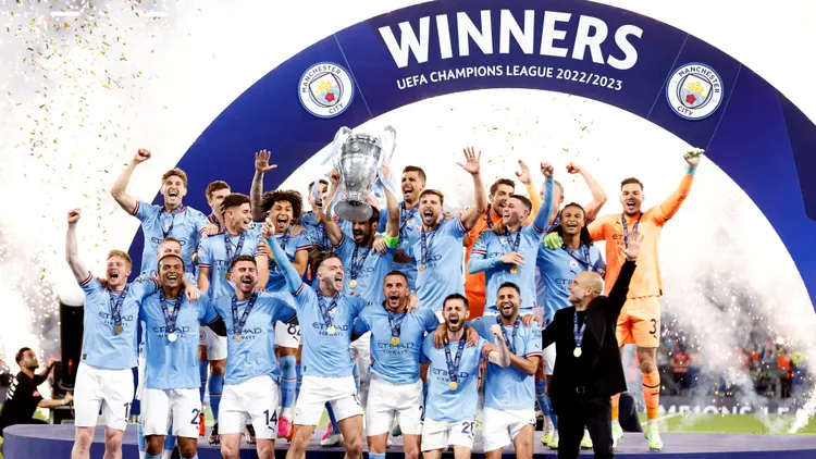 /images/f/c/-/fc-internazionale-v-manchester-city-fc-uefa-champions-league-final-2022-23-manchester-city-players-kyle-walker-ruben-dias-kalvin-phillips-john-stones-nathan-ake-ilkay-gundogan-erling-haaland-jack-grealish-aymeric-laporte-rodrico-rodri-kevin-de-bruyne-stefan-ortega-julian-alvarez-bernardo-silva-sergio-gomez-manuel-akanji-riyad-mahrez-ederson-maximo-perrone-scott-carson-phil-foden-cole-palmer-rico-lewis-pep-guardiola-celebrate-lifting-the-uclf-trophy-after-winning-the-uefa-champions-league-2022-23-final-match-between-fc-internazionale-and-manchester-city-at-ataturk-olympic-stadium-on-june-10-2023-in-istanbul-turkey-istanbul-ataturk-olympic-stadium-turkey-turkey-copyright-xrichardxsellers-sportsphoto-aplx-13950831jpg_1751098431442.jpg