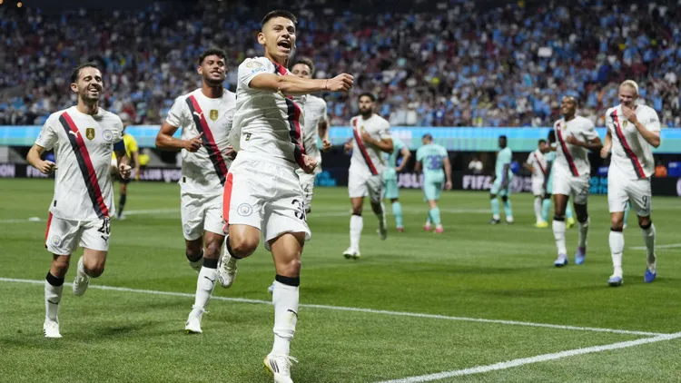 /images/f/o/o/football-club-world-cup-manchester-city-s-claudio-echeverri-front-reacts-after-scoring-his-team-s-second-goal-from-a-free-kick-during-the-first-half-of-a-club-world-cup-group-g-match-against-al-ain-in-atlanta-georgia-on-june-22-2025-a14aa0004674697pjpg_1753788505249.jpg