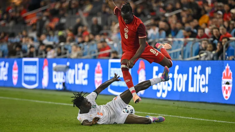 /images/i/s/m/ismael-kone-of-canada-evades-a-sliding-tackle-from-wilfred-singo-during-the-canadian-shield-match-between-canada-and-ivory-coast-at-bmo-field-featuring-wilfred-singo-ismael-kone-where-toronto-canada-when-10-jun-2025-credit-captive-camera-cover-images-editorial-use-only-not-for-use-by-newspapers-based-in-the-uk-copyright-xx-coverimg54836847jpg_1751997809049.jpg