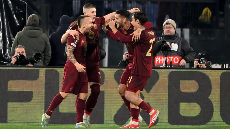 /images/j/o/s/jose-angel-esmoris-tasende-angelino-of-as-roma-celebrates-with-artem-dovbyk-lorenzo-pellegrini-and-paulo-dybala-after-scoring-the-goal-of-1-0-during-the-europa-league-football-match-between-as-roma-and-eintracht-frankfurtat-olimpico-stadium-in-rome-italy-january-30-2025-andreaxstacciolijpg_1750847268140.jpg