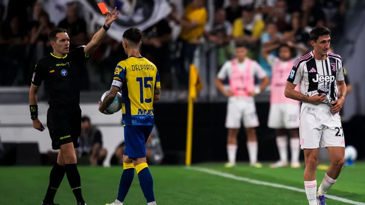 /images/j/u/v/juventus-fc-v-parma-calcio-serie-a-referee-matteo-marcenaro-shows-a-red-card-to-andrea-cambiaso-of-juventus-fc-during-the-serie-a-football-match-between-juventus-fc-and-parma-calcio-turin-italy-copyright-xnicolxcampoxjpg_1756230772006.jpg