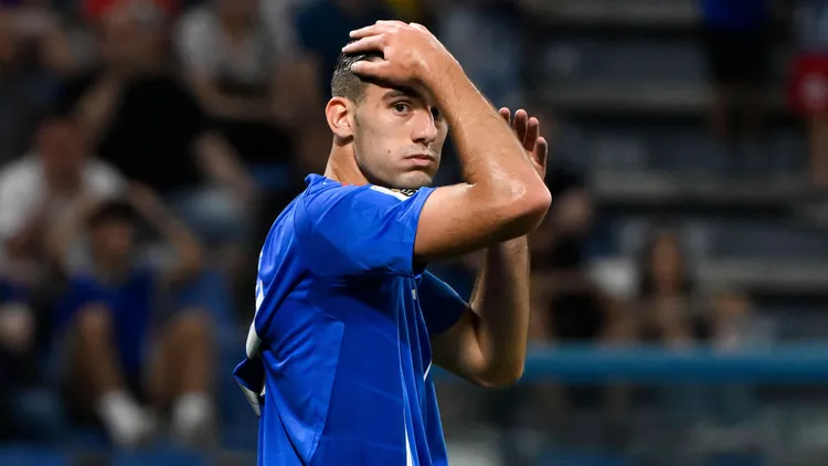 /images/l/o/r/lorenzo-lucca-of-italy-reacts-during-the-fifa-2026-qualifier-football-match-between-italy-and-moldova-at-citta-del-tricolore-stadium-in-reggio-emilia-italy-june-9-2025-andreaxstacciolijpg_1752576424969.jpg