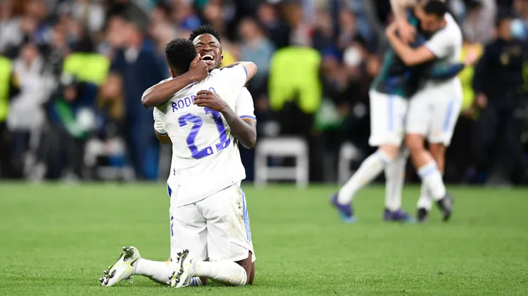 /images/r/e/a/real-madrid-v-manchester-city-semi-final-leg-two-uefa-champions-league-vinicius-junior-and-rodrygo-of-real-madrid-celebrate-victory-after-the-uefa-champions-league-semi-final-leg-two-match-between-real-madrid-and-manchester-city-at-estadio-santiago-bernabeu-on-may-4-2022-in-madrid-spain-madrid-spain-copyright-xjosexbretonx-originalfilenamebreton-realmadr220504npidvjpgjpg_1750846239839.jpg