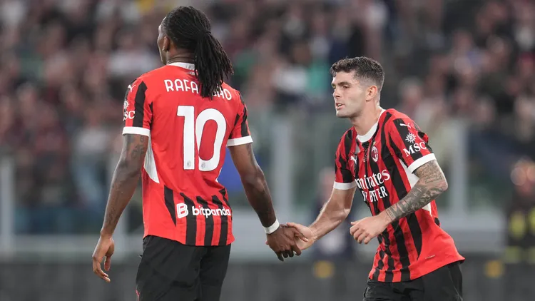 /images/r/o/m/rome-italy-may-14-christian-pulisic-and-rafael-leao-of-ac-milan-during-the-coppa-italia-final-match-between-ac-milan-and-bologna-fc-at-stadio-olimpico-on-may-14-2025-in-rome-italy-copyright-xfotoagenziaxjpg_1752582426596.jpg