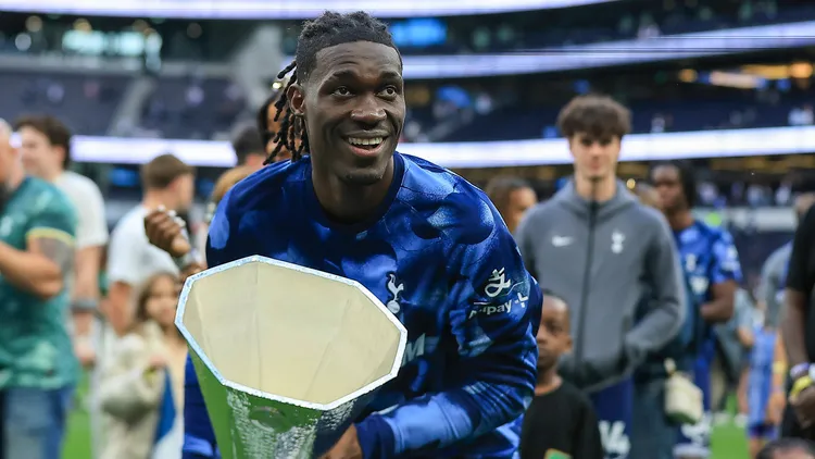 /images/t/o/t/tottenham-hotspur-v-brighton-and-hove-albion-premier-league-25-05-2025-tottenham-hotspur-midfielder-yves-bissouma-8-lifts-the-uefa-europa-league-trophy-during-the-premier-league-match-between-tottenham-hotspur-and-brighton-and-hove-albion-at-tottenham-hotspur-stadium-london-united-kingdom-on-25-may-2025-editorial-use-only-dataco-restrictions-apply-see-wwwfootball-datacocom-copyright-xchrisxfoxwellx-psi-22153-0245jpg_1751708016976.jpg