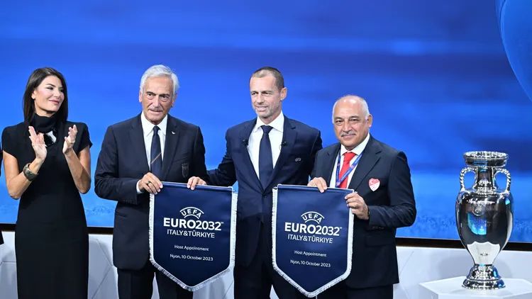 /images/t/u/r/turkiye-and-italy-confirmed-to-co-host-2032-uefa-european-football-championship-geneva-switzerland-october-10-uefa-president-aleksander-ceferin-2nd-r-turkish-football-federation-president-mehmet-buyukeksi-r-and-federal-president-gabriele-gravina-2nd-l-and-the-delegations-of-the-two-countries-pose-for-a-photo-at-the-ceremony-held-after-the-executive-board-meeting-in-nyon-geneva-switzerland-on-october-10-2023-uefa-announced-that-the-hosting-of-the-2032-european-football-championship-euro-2032-has-been-granted-to-the-partnership-of-turkiye-and-italy-isvire-world-editorial-use-only-please-get-in-touch-for-any-other-usage-copyright-x2025xanadoluxdursunxaydemirxjpg_1757073377051.jpg